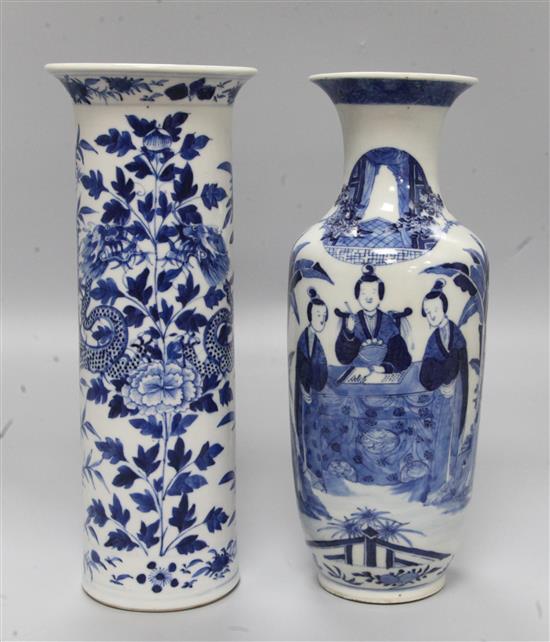 A Chinese 19th century blue and white cylindrical vase and a similar baluster vase, H 31cm (largest)